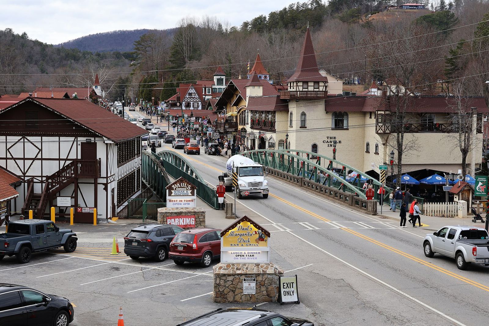 Downtown Helen with Bavarian-style buildings along the main road and a bridge over the Chattahoochee River